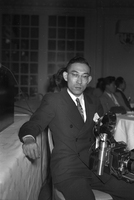 Rev. Tamayose (Hawaii), May 9, 1948, Item 10: James Numata with camera