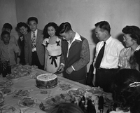 Chicago Buddhist Church (Bay Party), September 1948, Item 3: From left: Tom Ito (with tie), Haruko Uyeda (white dress), Rev. Kubose (with tie, no jacket), Minnie Kubose (far right)