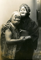 New Year's Party, Item 24, front: Masked performers at the New Year's Eve party