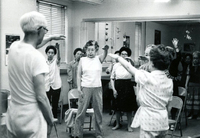 Blood Assurance, Communal Living, Issei Work Center, Body Dynamics, Annual Community Picnic, and Market Day, Item 12: Body Dynamics class led by Rev. Andrew Oyama (far left)