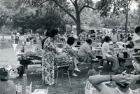 Annual [Community] Picnic, Item 19, front: Aya Yamakoshi (foreground, far left, wearing print fabric outfit)