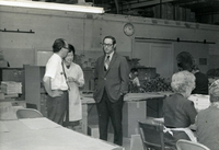 Workshop [Senior Work Center], Item 9, front: Left to right (standing): Mr. Nambu, workshop supervisor Pauline Yoshioka, and Dr. Bruce Douglas, Illinois state representative, who was visiting the work center