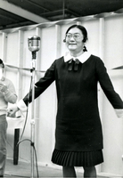 New Year's Party, Item 18, front: Workshop supervisor Haru Tanaka performs at the New Year's party