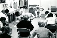 Blood Assurance, Communal Living, Issei Work Center, Body Dynamics, Annual Community Picnic, and Market Day, Item 14: Rev. Andrew Oyama (center, wearing white T-shirt) leads Body Dynamics class