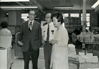 Workshop [Senior Work Center], Item 10, front: Dr. Bruce Douglas, Illinois state representative, visits the work center. Left to right: Dr. Douglas, Mr. Nambu, and Pauline Yoshioka, workshop supervisor