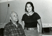 Visitation (Sanseis visit Isseis), Item 2, front: Janette Koga visits Mr. Miyagi, who is blind and a nursing home resident