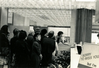 Issei Social Program, Item 30, front: Issei visit flower show at McCormick Place. Mrs. Shikami is standing at the back of the group