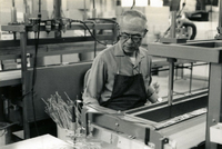 Workshop [Senior Work Center], Item 25, front: Mr. Tomiyama at work